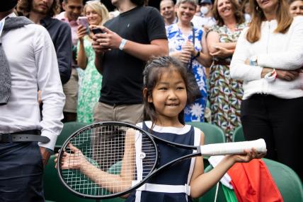 July 11, 2021, London, England, UK - Novak Djokovic celebrates his victory and gives a young fans his racket © Andy Hooper/Daily Mail/dmg media Licensing,Image: 621065326, License: Rights-managed, Restrictions: , Model Release: no, Credit line: Andy Hooper / Solo / Profimedia