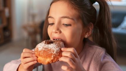 Kako naučiti dete da ne jede previše slatkiša