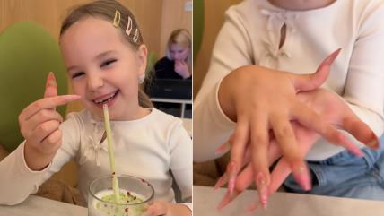 Devojčica sa dugačkim veštačkim noktima